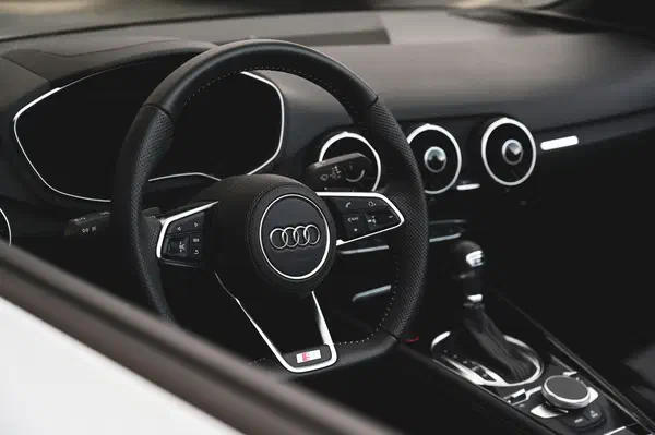 Audi steering wheel at close detail, the chauffeur's instrument under the standard this engagement applies